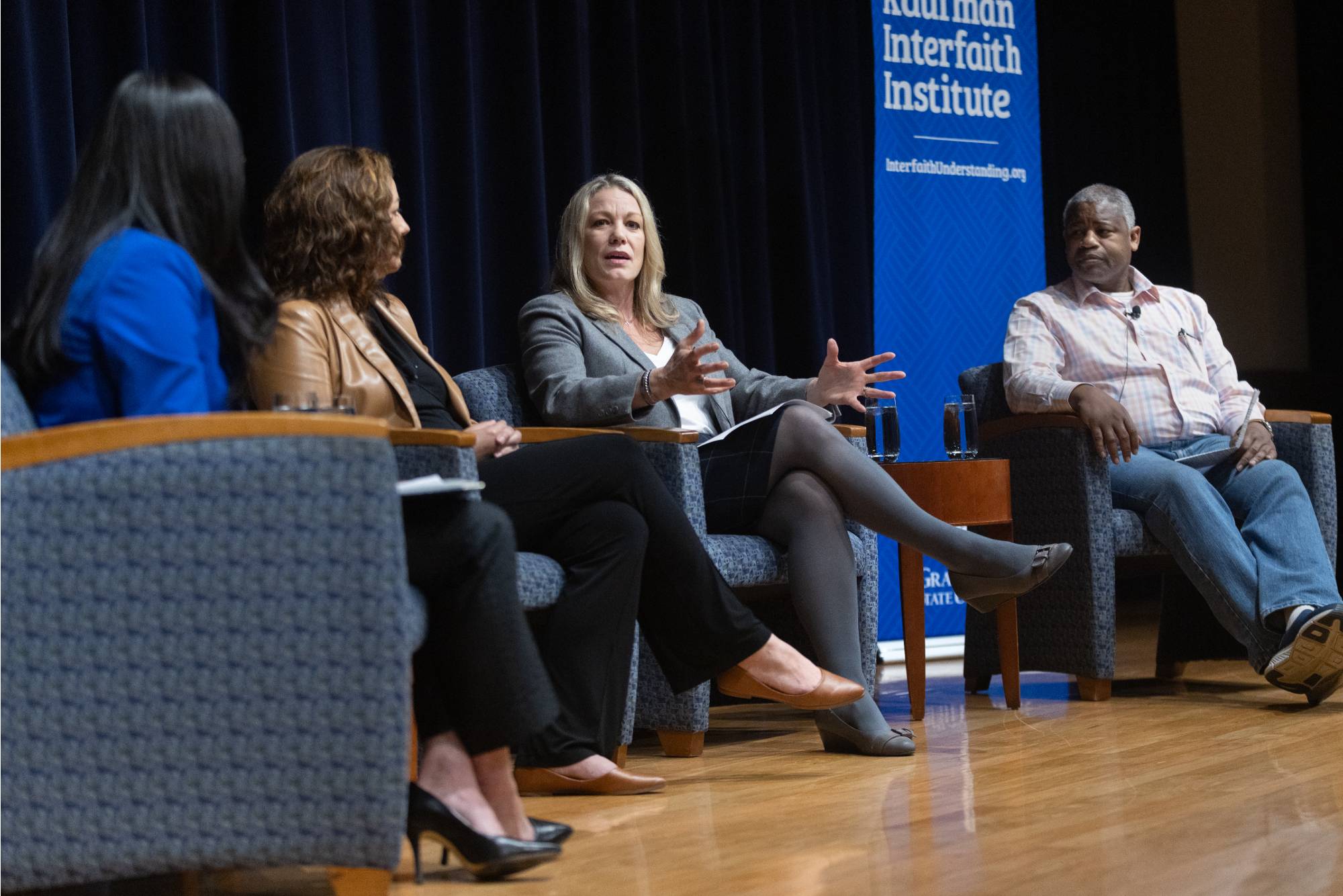 person speaking at a podium